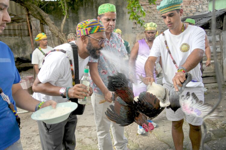 Cuba’s Santeros offer gifts, ask deities for peace
